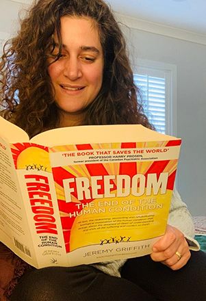 Angela Ryan World Transformation Movement Ballarat founder reading ‘FREEDOM’