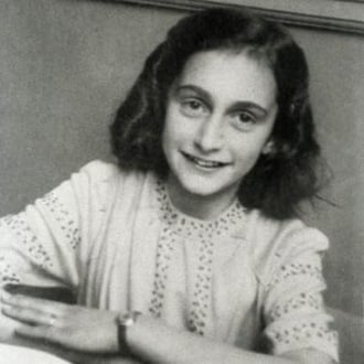 Portrait photograph of Anne Frank as a young girl