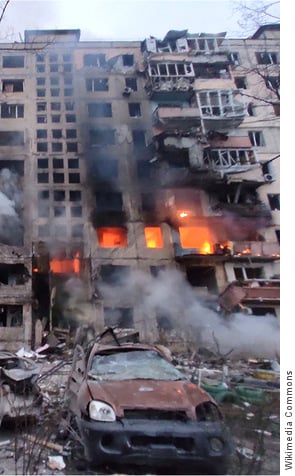 Apartment building in Kyiv, Ukraine, burning after Russian artillery shelling