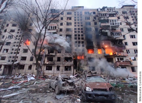 Apartment building in Kyiv, Ukraine, burning after Russian artillery shelling