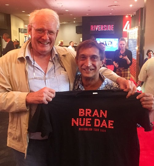 Michael with Jeremy Griffith holding up the Bran Nue Day shirt