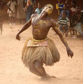 African tribesman performing traditional dance