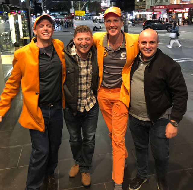 WTM Melbourne founders, Sam A and Frank, with Doug and Sam B from WTM Sydney who are dressed in orange
