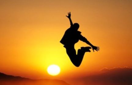 Man jumping with sun in the background