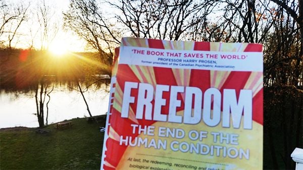 FREEDOM book by the Delaware River at sunrise