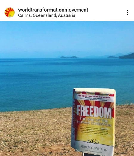 The book FREEDOM on Cairns beach