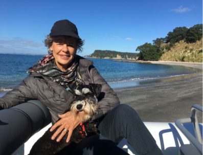 Heather Mackintosh, co-founder of the World Transformation Movement Wellington Centre, at the beach with her dog