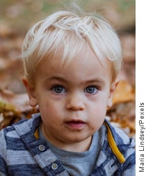 Portrait of fair-headed, innocent looking baby boy