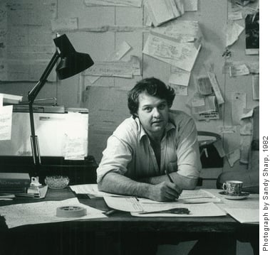 Jeremy as a young man at his writing desk