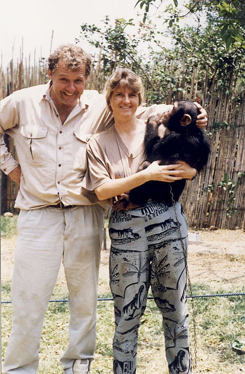 Jeremy Griffith with Dr Susanne Abildgaard and common chimp at Jane Goodall's Chimpanzee Rehabilitation Centre in Burundi