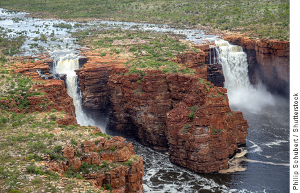 Aerial view of a river and waterfall in full flood, King George Twin Falls in Western Australia’s Kimberley region