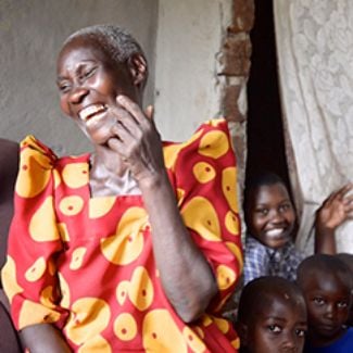 Older Ugandan woman laughing