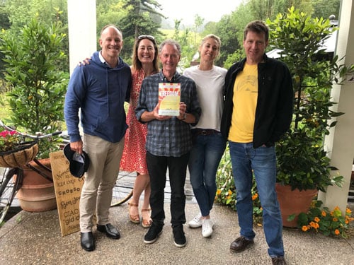 Founding WTM members with Peter Sadler holding the book FREEDOM