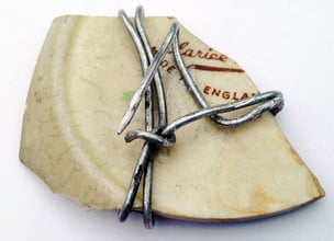 Pottery brooch by Jeremy Griffith with illustration of an English pastoral scene - rear view