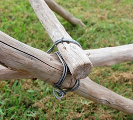 Detail of a cobb and co wire hitch to secure joint of stick furniture chair