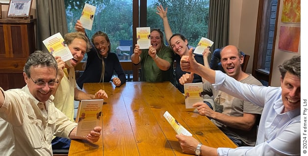 Tony Gowing and founding members of WTM holding up copies of THE Interview