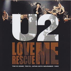 Irish rock-bank U2 performing live in concert on the cover of their 1987 ‘Love Rescue Me’ album cover