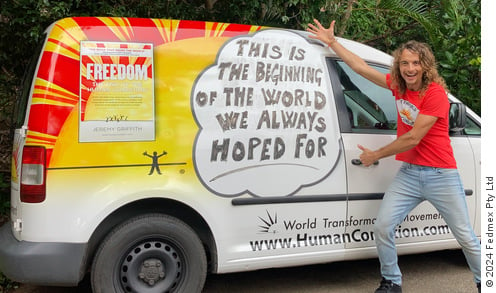 Van with World Transformation Movement branding
