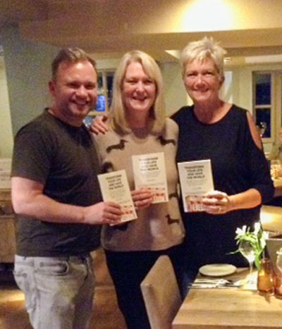 World Transformation Movement Hertfordshire with their copies of Transform Your Life