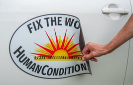 Image of car with ‘Fix The World’ Oval Sticker on its bonnet