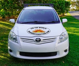 Image of car with ‘Fix The World’ Oval Sticker on its bonnet