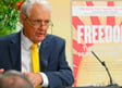 Jeremy Griffith presenting in front of FREEDOM book banner at book launch