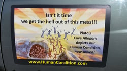 Magnet of Humanity’s liberation poster on car door with dog leaning out the window