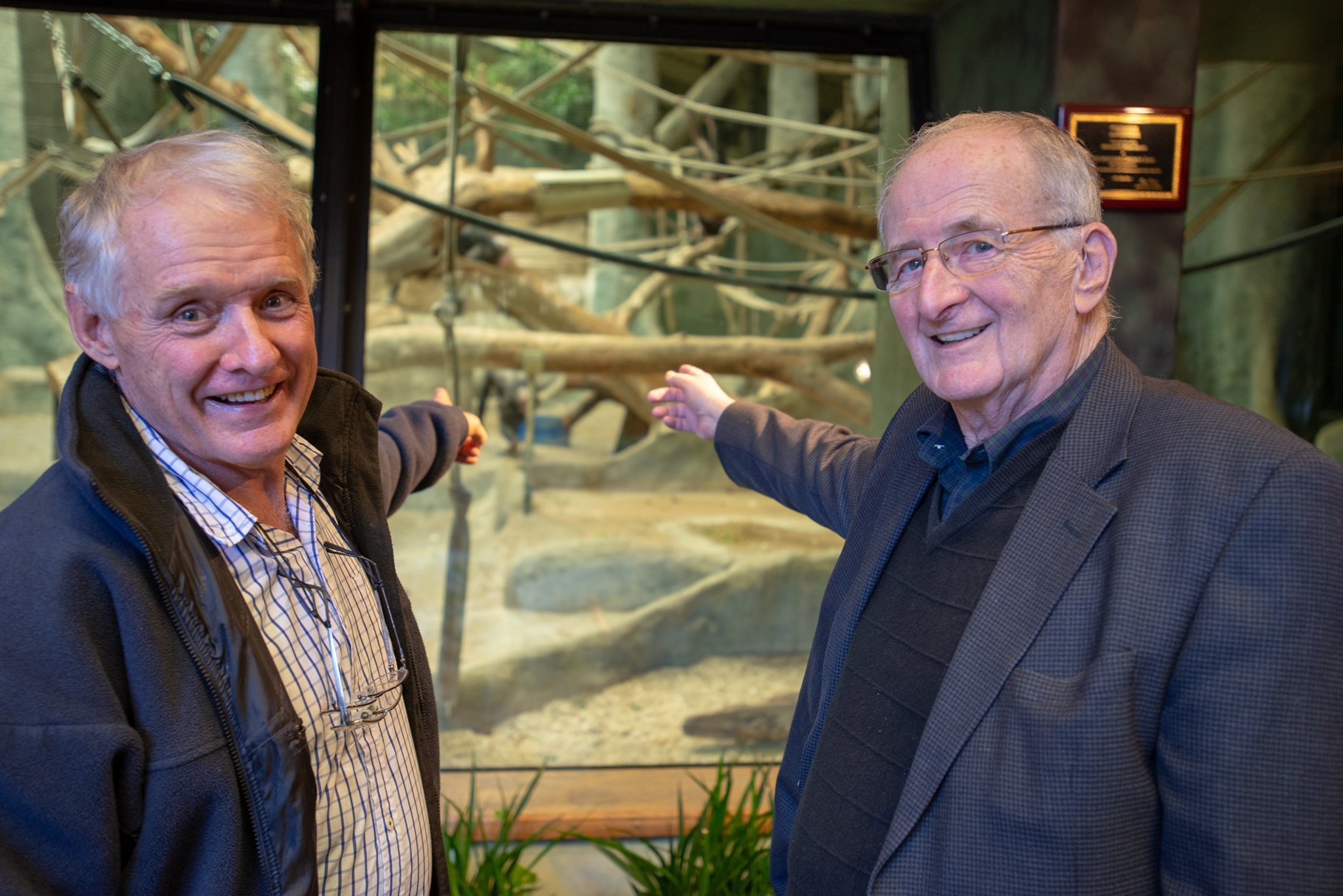 Jeremy Griffith and Professor Prosen in front of the Bonobo enclosure at the Milwaukee County Zoo