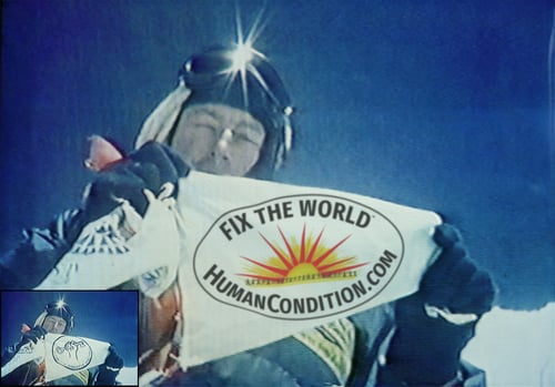 Tim on the summit of Mt Everest in 1990, with the flag of the WTM/FHA