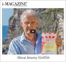 Image from i-MAGAZINE article of Jeremy Griffith holding a copy of FREEDOM