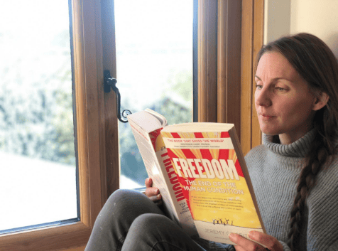 Beth reading Jeremy Griffith's book 'FREEDOM'