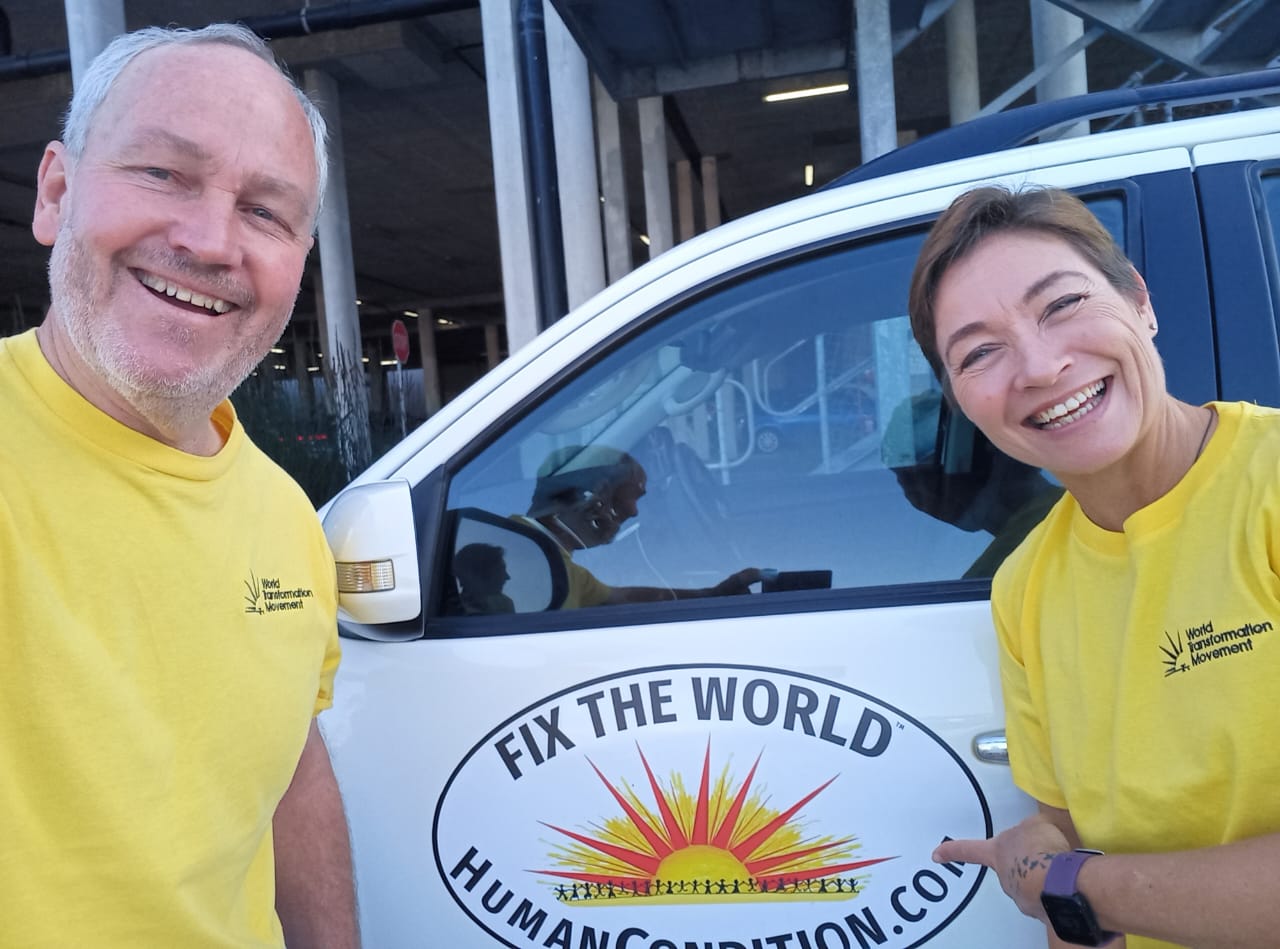 Sharon with WTM Cape Town Centre founder James Moffett in front of a Fix The World car sticker