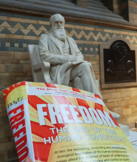 Freedom book in front of Darwin statue at the NHM