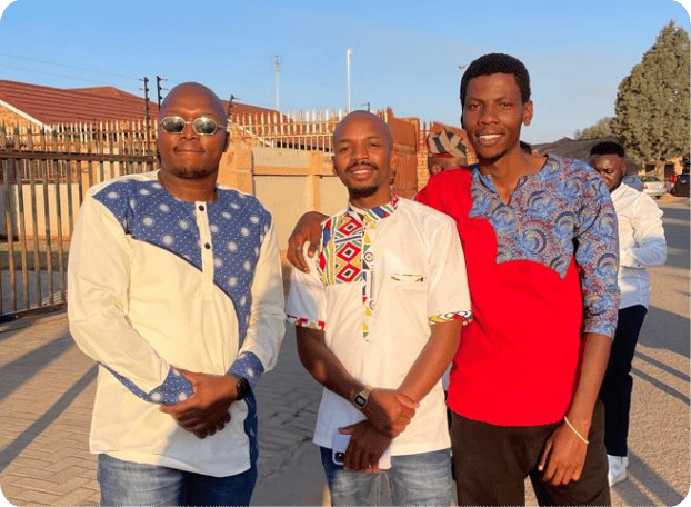Refentse (on right) with two of his friends in Mahikeng